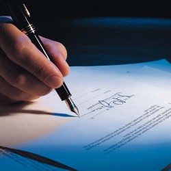 072019A — Business man, hand holding pen, signing contract,
